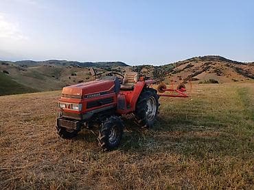 Компактный трактор Yanmar FF205 с навесными граблями-ворошилками at lalafo.kg Компактный трактор Yanmar FF205 с навесными граблями-ворошилками