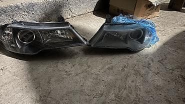 разные свечи: Комплект передних фар Geely — 1