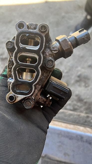 Электромагнитный клапан управления фазами газораспределения