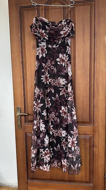 юбка вечерняя: Длинное женское платье на бретелях с цветочным принтом. - Фасон — 2