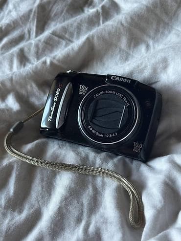 Продаю цифровую камеру Canon sx120 is с выдвижной вспышкой идеальный