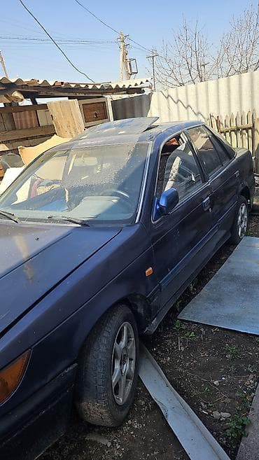 биайди 2: Mitsubishi Lancer: 1990 г., 1.5 л, Кол менен иштөөчү, Бензин, Седан — 4