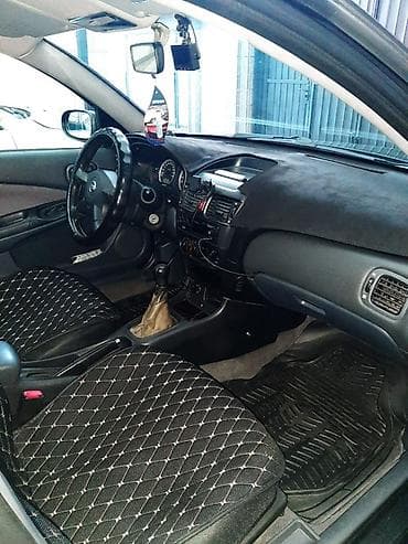 Nissan Almera: 2004 г., 1.5 л, Механика, Бензин, Хэтчбэк — 6