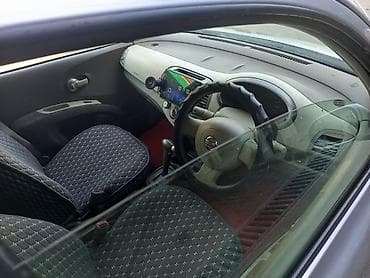 mazda cronos: Nissan March: 2003 г., Автомат — 2