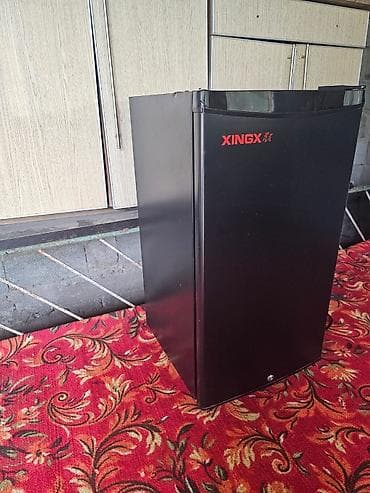 холадилник: Компактный однодверный холодильник XINGX (чёрный) - Форм‑фактор — 2
