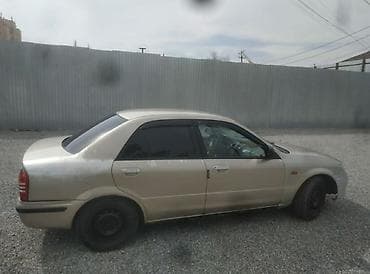 protege: Mazda Familia: 2001 г., 1.5 л, Автомат, Бензин, Седан — 6