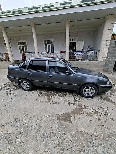 адисей обсалют: Daewoo Nexia: 1996 г., Седан — 9