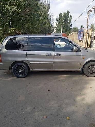Kia Carnival: 2001 г., 2.5 л, Бензин, Минивэн