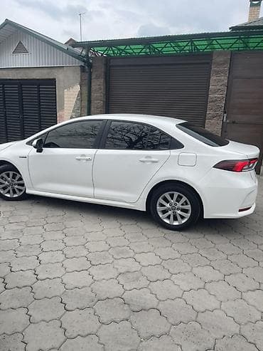 toyota aurius: Toyota Corolla: 2022 г., 1.8 л, Вариатор, Гибрид, Седан — 6