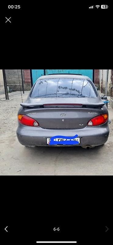 byd e7: Hyundai Elantra: 2000 г., Седан — 6
