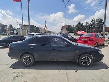 авто салона: Toyota Carina E: 1994 г., 1.6 л, Механика, Бензин, Седан — 8