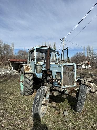 Тракторы ХТЗ: Трактор колесный с кабиной, класс тяги примерно 1,4–2,0 (типовая — 4