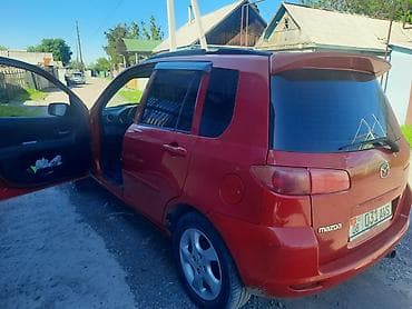 Унаа сатуу: Mazda Demio: 2003 г., 1.4 л, Кол менен иштөөчү, Бензин, Хетчбек — 4
