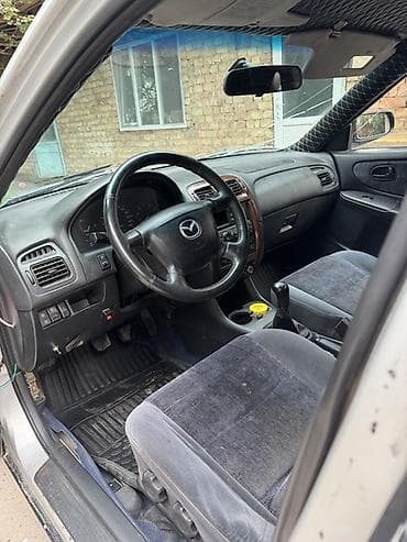 subaru авто: Mazda 626: 1999 г., 1.8 л, Механика, Бензин, Лифтбек — 6