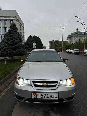 bmw e63: Представлен седан Chevrolet Nexia серебристого цвета. Автомобиль — 2