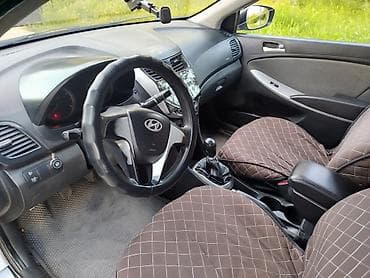 арзан матиз 1: Hyundai Solaris: 2012 г., 1.4 л, Кол менен иштөөчү, Бензин, Седан — 3