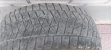 Шина зимняя Bridgestone Blizzak DM‑V2 - Размер: 245/55 R19 103T at lalafo.kg Шина зимняя Bridgestone Blizzak DM‑V2 - Размер: 245/55 R19 103T
