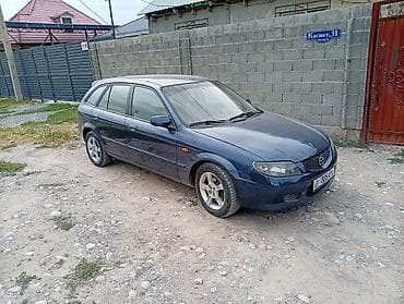 мазда 32: Mazda 323: 2003 г., 1.6 л, Механика, Универсал — 4
