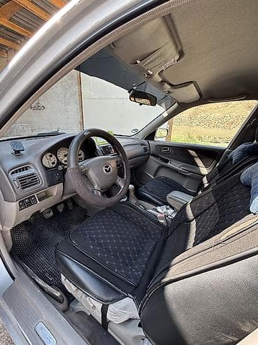 mazda millena: Mazda Capella: 2001 г., 2 л, Механика, Бензин, Универсал — 6