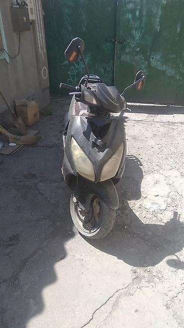 электо мото: Скутер (бензиновый), класс 50–125 см³ Описание: - Компактный — 1