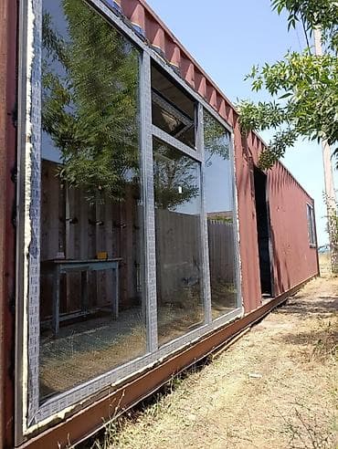 Модульный дом из морского контейнера с панорамным остеклением -