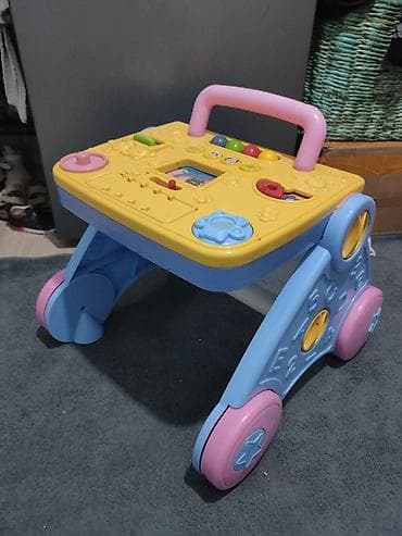 алфа: Детский ходунок-каталка с развивающей панелью. Особенности: - — 2
