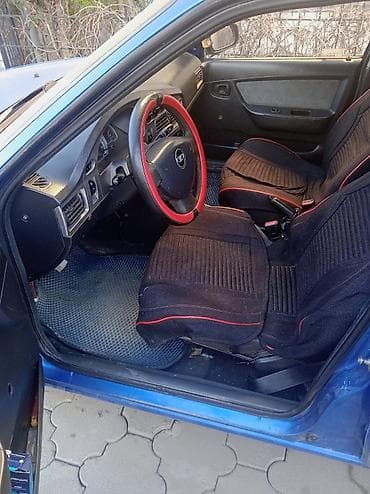 дом на калесах: Daewoo Nexia: 2012 г., Седан — 5