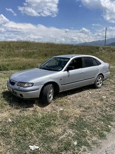 газ 69: Mazda 626: 1999 г., 1.8 л, Бензин, Седан — 2