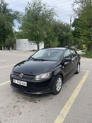 Volkswagen Polo: 2010 г., 1.6 л, Механика, Бензин, Седан