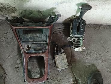 консольные насосы: Пластик центральной консоли + блок селектора АКПП + электронный модуль — 2