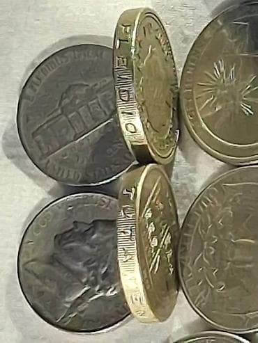 Набор монет для коллекционеров. Состав: - Несколько британских монет