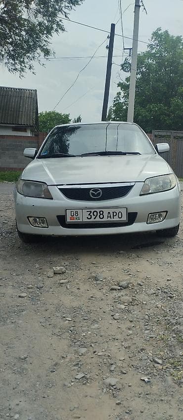 авто мазда: Mazda 323: 2001 г., 1.6 л, Механика, Газ, Универсал — 5