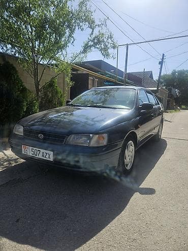 тико 2: Toyota Carina E: 1993 г., 2 л, Кол менен иштөөчү, Бензин, Седан — 4