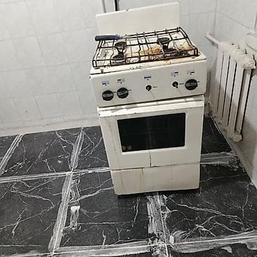 Газовая плита с духовкой, напольная. Характеристики: - 4 газовые — 1