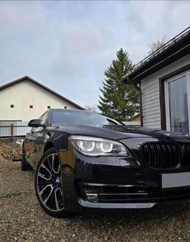 шторка е34: BMW 7 series: 2012 г., 4.4 л, Автомат, Бензин, Седан — 7
