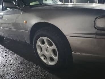 домкраты авто: Toyota Camry: 1992 г., Механика, Газ, Универсал — 5