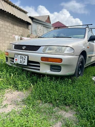 купить гоночную машину: Mazda Familia: 1996 г., Механика, Бензин, Седан — 1