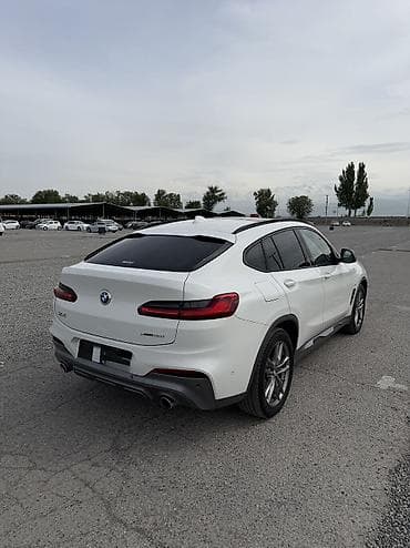 x 7: BMW X4 — интерьер и оснащение - Спортивный кожаный руль M с — 5