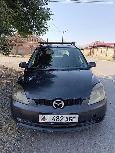 Mazda Demio: 2005 г., 1.3 л, Газ, Хетчбек — 1