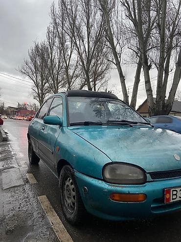 e53 4 8: Mazda 121: 1992 г., 1.3 л, Механика, Бензин — 5