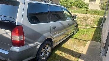 Mitsubishi Chariot: 1999 г., 2.4 л, Механика, Бензин, Минивэн — 9