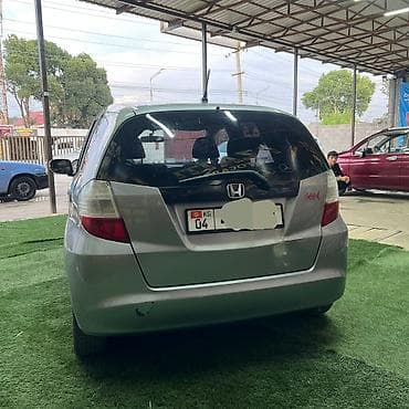 Honda Jazz: 2009 г., 1.3 л, Механика, Бензин, Хэтчбэк — 4