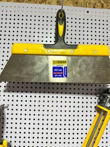 Шпатель Oskar шириной 400 мм предназначен для выравнивания и нанесения at lalafo.kg Шпатель Oskar шириной 400 мм предназначен для выравнивания и нанесения