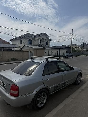Mazda 323: 2003 г., 1.6 л, Механика, Бензин, Седан — 3