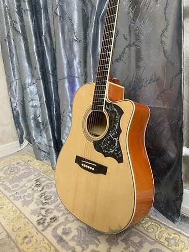 Гитары: Электроакустическая гитара формата дредноут с вырезом. Характеристики — 3