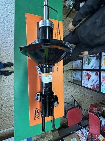 ходовые: Передний амортизатор Subaru Оригинал, Япония — 1