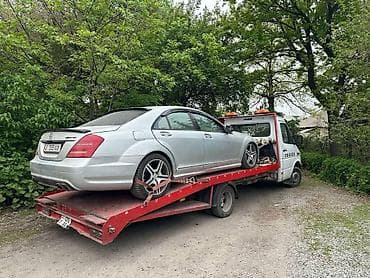 Услуги эвакуатора: С манипулятором, С лебедкой, С ломаной платформой — 1