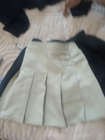 Киреге берилүүчү кийимдер: Юбка, Юбканын модели: Плиссе, Мини, Трикотаж — 1