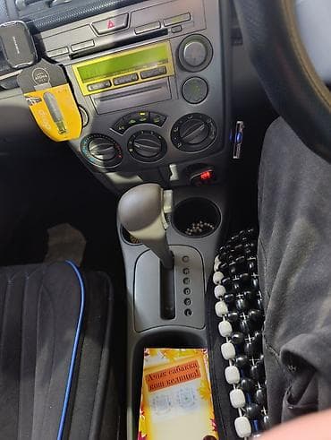 forester 2003: Mazda Demio: 2003 г., Автомат, Хэтчбэк — 4