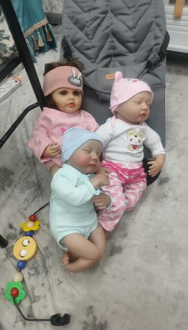 Реалистичная кукла-реборн (девочка) с длинными тёмными волосами